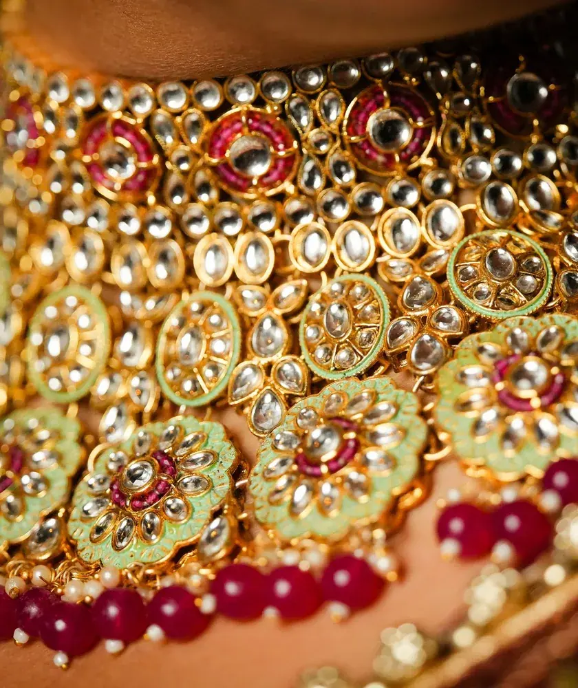 Close-up of a kundan bridal choker with ruby beads